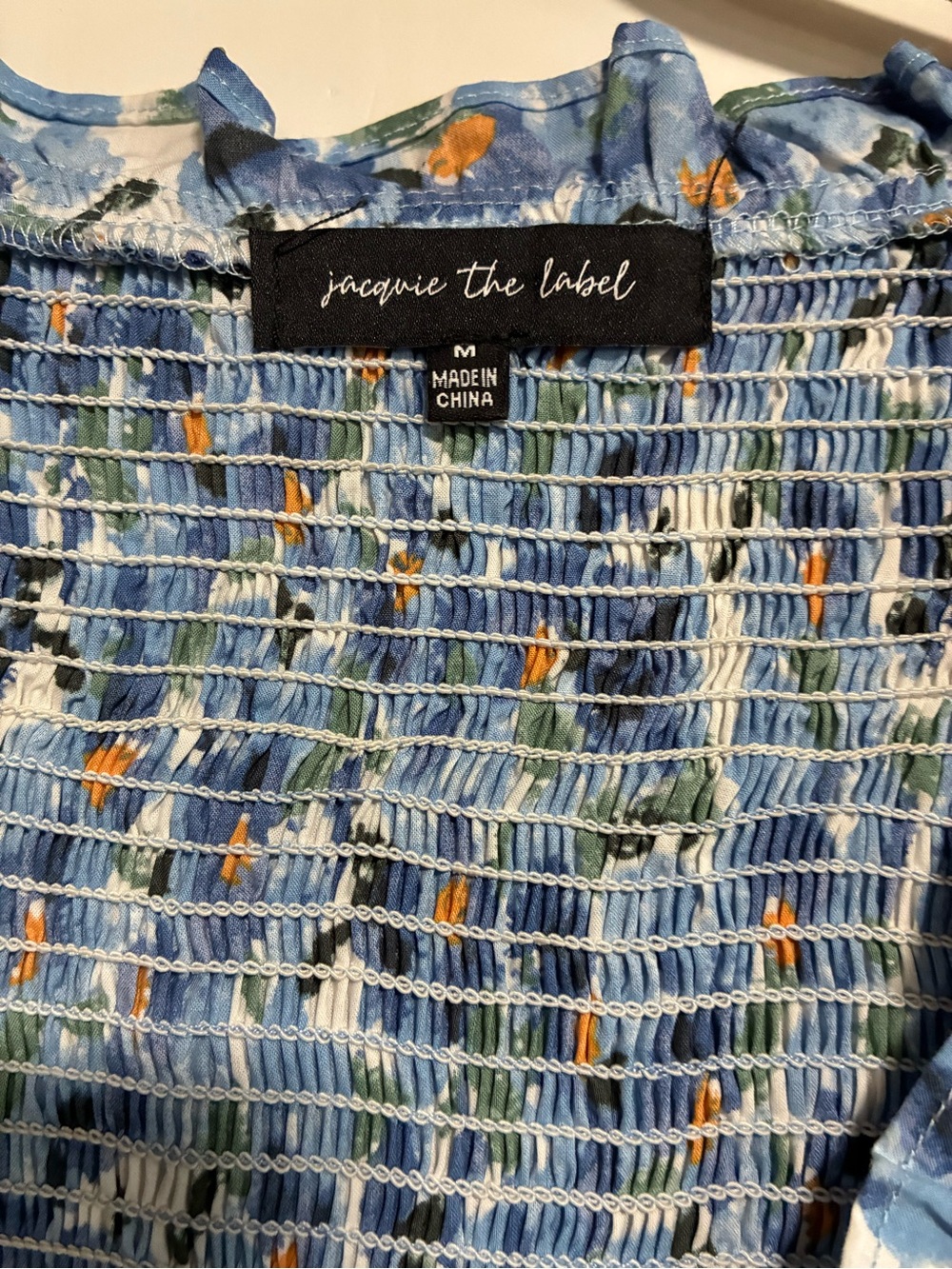 Jacqui E Blue Floral Smocked Midi Dress with Orange Accents - Picture 5 of 7